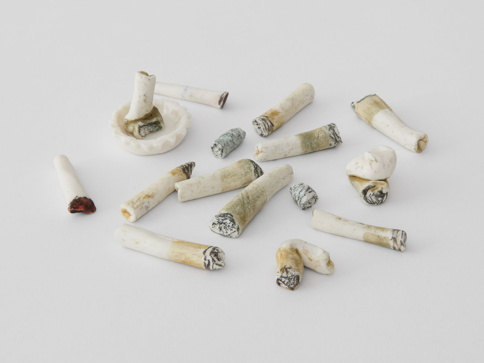distinctive cigarette butt Cigarette Butts by Charlotte Beaudry